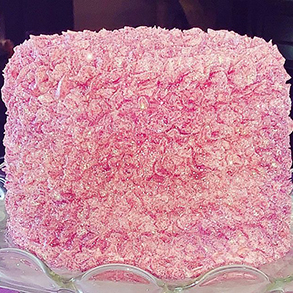 ruffle smash cake with edible glitter